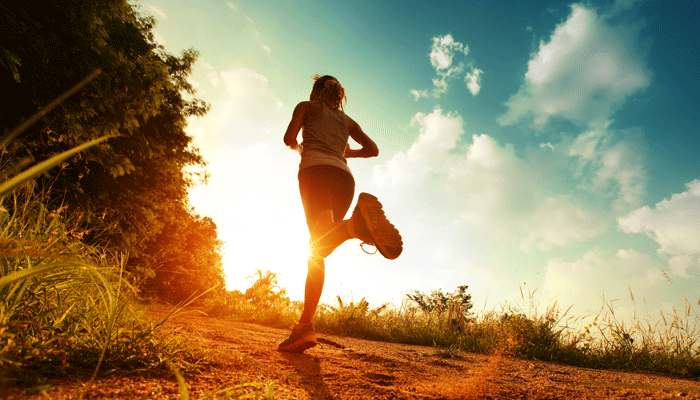 woman-trail-running-sunset